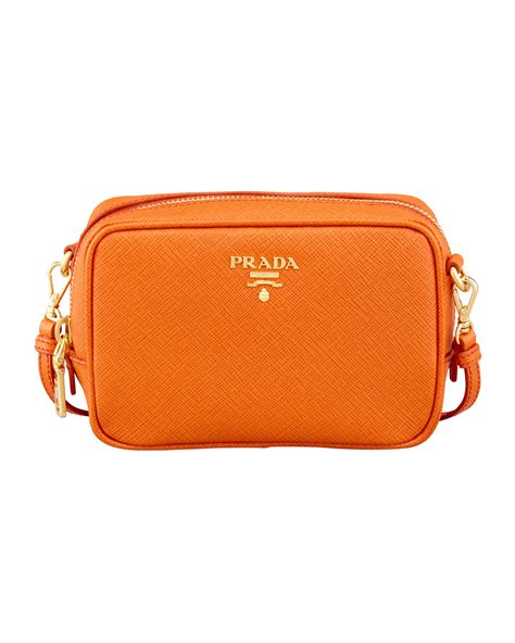 prada orange crossbody|Prada crossbody with guitar strap.